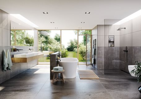 A bathroom with a tub and a sinkDescription automatically generated