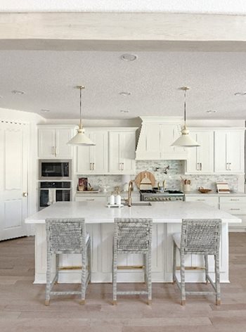 Unfinished faux wood beams custom painted white
